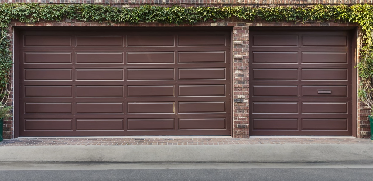 Professional technician performing garage door installation in South Miami, FL, ensuring quality and reliable service for residential and commercial properties.
