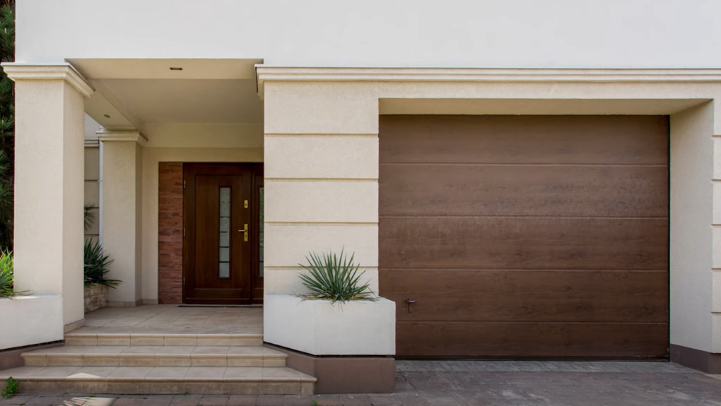 a technician providing same-day garage door repair service in South Miami, FL